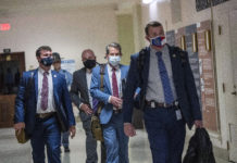 Georgia Gov. Kemp signs GOP election bill amid an outcry Georgia Gov. Brian Kemp