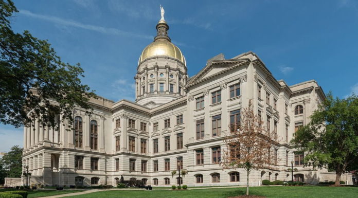 GOP’s Carr seeks another term as Georgia attorney general Four story ornate, white Atlanta Gold Dome Capitol building - westside view