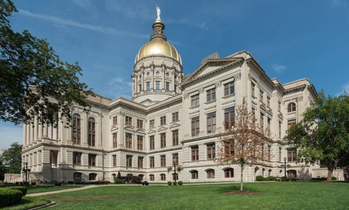 Four story ornate, white Atlanta Gold Dome Capitol building - westside view