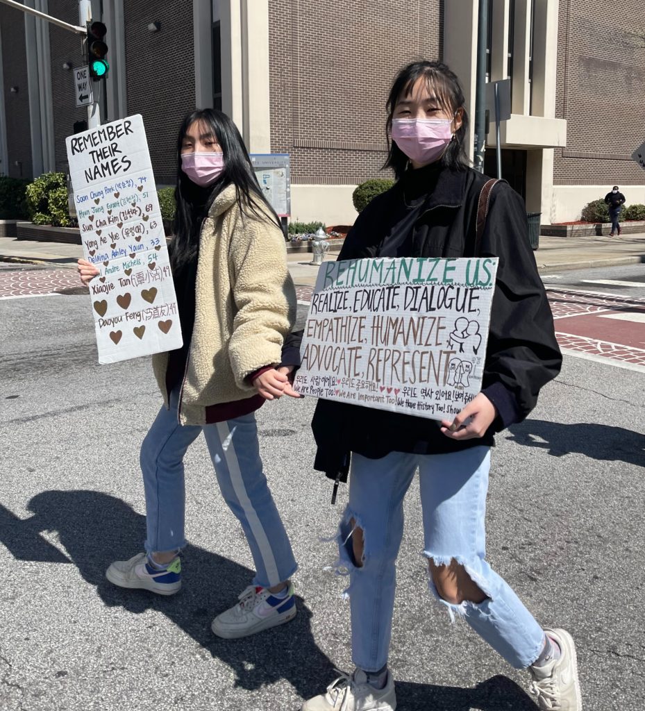 Protestors gather Saturday, March 20, 2021 at Liberty Plaza in downtown Altanta, Georgia to demonstrate against anti-Asian hate in response to the mass shooting that killed eight people including five women of Asian decent.