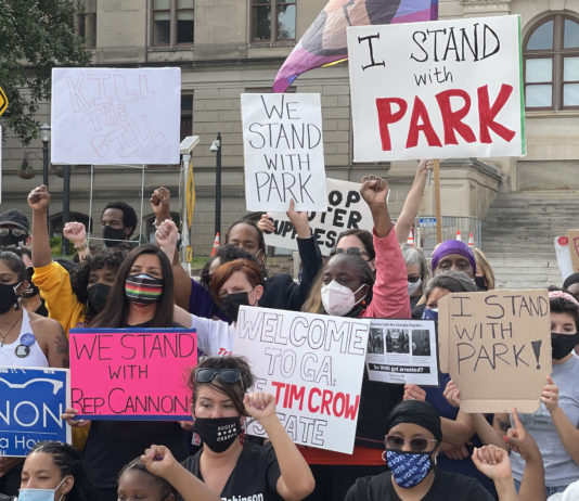 Election overhaul faces strong backlash from Democrats, activists in Georgia people protesting outside the Georgia capitol