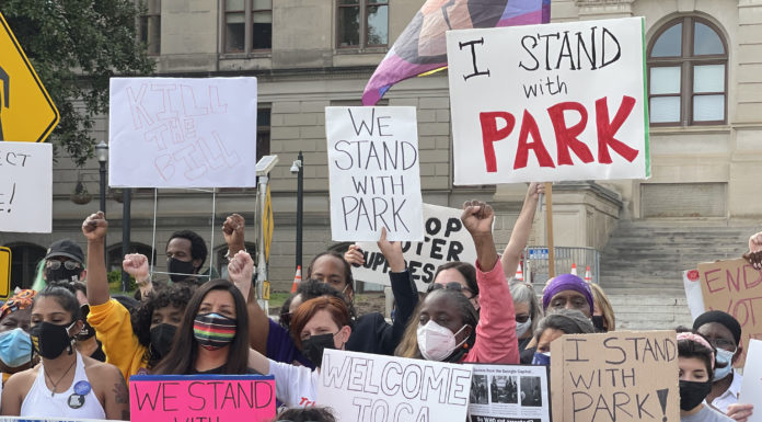 Election overhaul faces strong backlash from Democrats, activists in Georgia people protesting outside the Georgia capitol