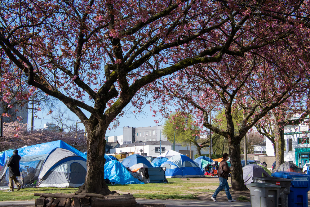homeless camps and tents on the field
