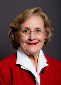 Medicaid expansion: Rep. Sharon Cooper headshot - Woman with short blonde hair and light-framed glasses wearing red suit jacket with white cllared blouse smiling in front of navy background