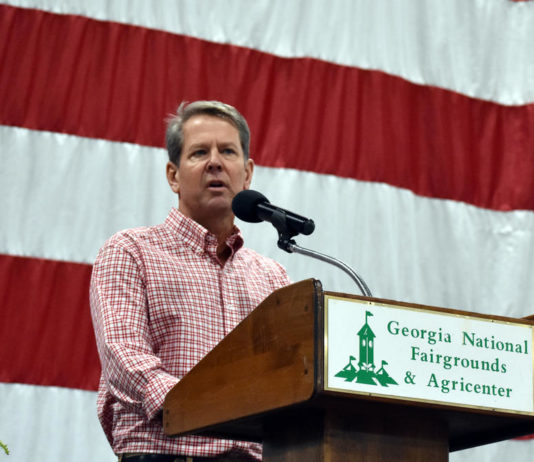 At GOP Fish Fry, Georgia Republican candidates break bread and brace for tough primaries gov. Brian Kemp at podium
