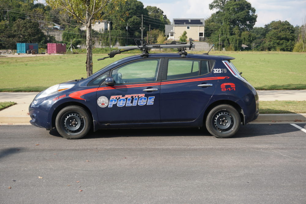 A small Atlanta police car with bike rack on top