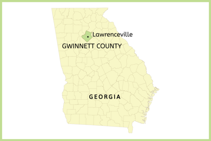 Gwinnett County highlighted in green located on a yellow map of Georgia.