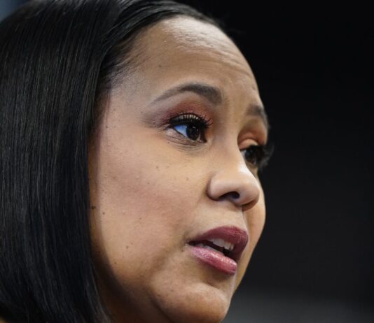 Georgia DA investigating Trump asks FBI for security help Close up of black woman speaking with raised eyebrows