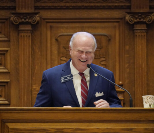 Noncitizen voting ban measure falls short in Georgia Senate white man with short white hair smiling in blue blazer with white shirt and red tie