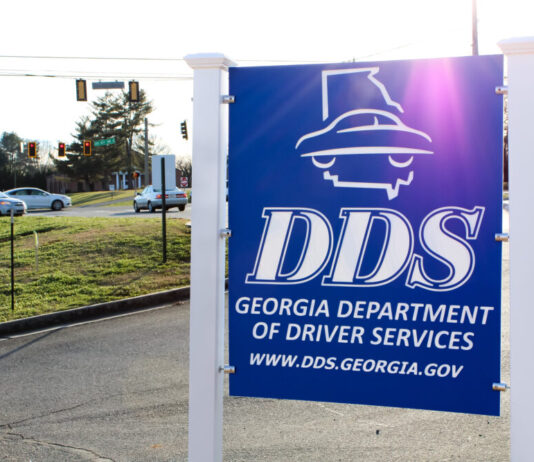 Driver Services proposes self-service kiosks to address staffing shortage outdoor blue sign with big white letters with DDS and Department of Driver Services.