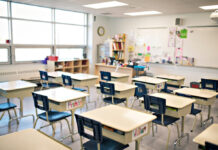 Georgia GOP pushes parent rights measure for public schools empty classroom with tan desks and blue chairs