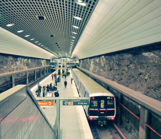 MARTA will launch a pilot program to test on-demand ride-sharing service A view of an underground train station with people walking around.