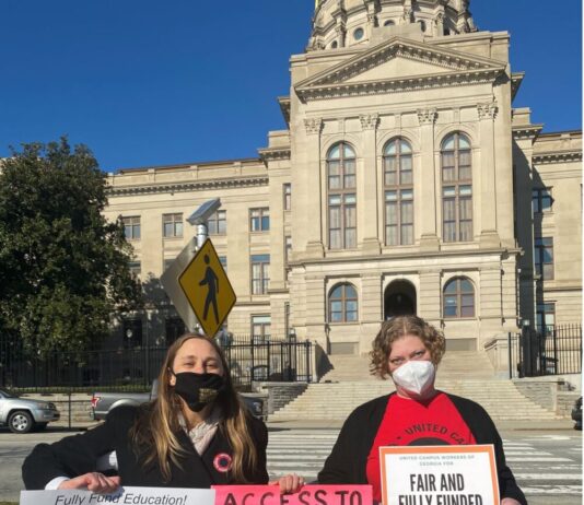 Campus workers protest outside of the Capitol to demand more funding Two white women holding signs in front of the Georgia Capital in protest