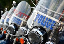First responders’ mental injuries to remain uncompensable First responders no mental health compensation: Wind shields on Atlanta police motorcycles parked closely in a row