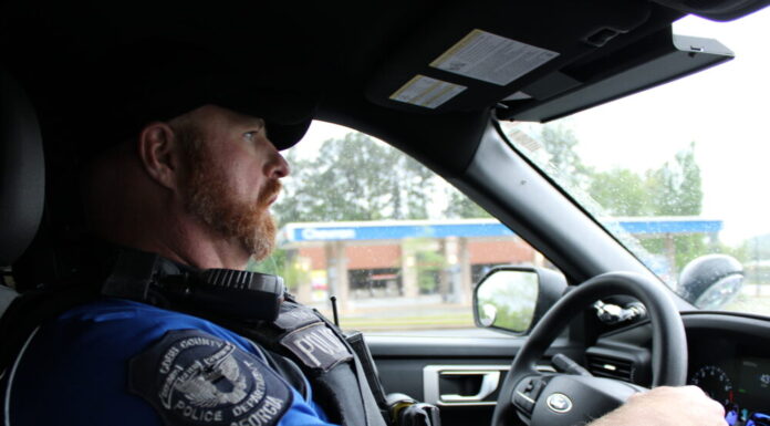 Marietta PD launches mental health unit: Could more pop up statewide? Police officer in uniform pictured inside his vehicle driving
