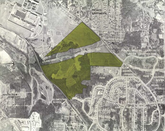 A greyscale map of the Thomasville Heights neighborhood in southeast Atlanta from 1968. A region of land is highlighted in dark green. The land parcel is empty.
