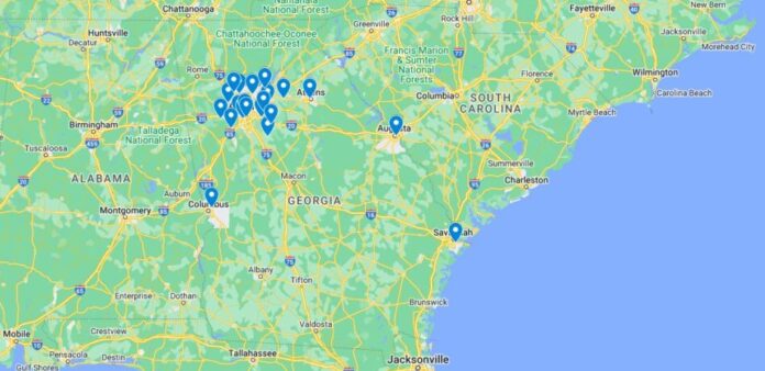 A Google map of the state of Georgia, the top of Florida, South Carolina, Tennessee and Alabama. There are 20 blue pins on the map, all representing incidents of violence in Georgia schools.