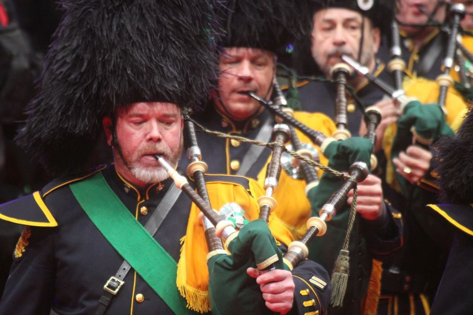 Three bagpipers.