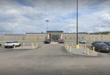 State leaders push bills to cooperate with ICE Folkston Detention Center in Folkston, Georgia. Front view of building.