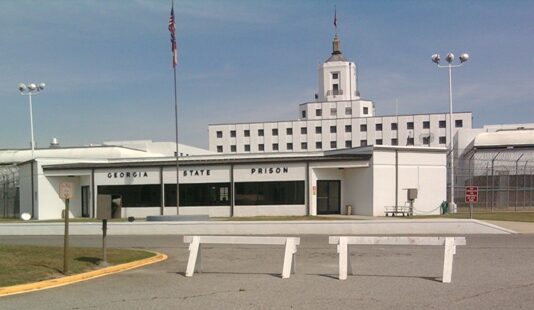 Governor seeks more money for correctional officers Georgia State Prison in Tattnall County. Front view of a white building.