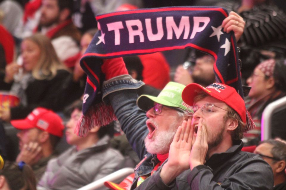 Trump supporters cheering on the President.