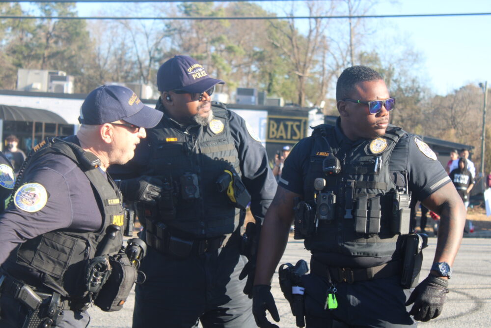 Police Officers from the Chamblee Police Department observing protestors (Zaire Breedlove/ Fresh Take Georgia).