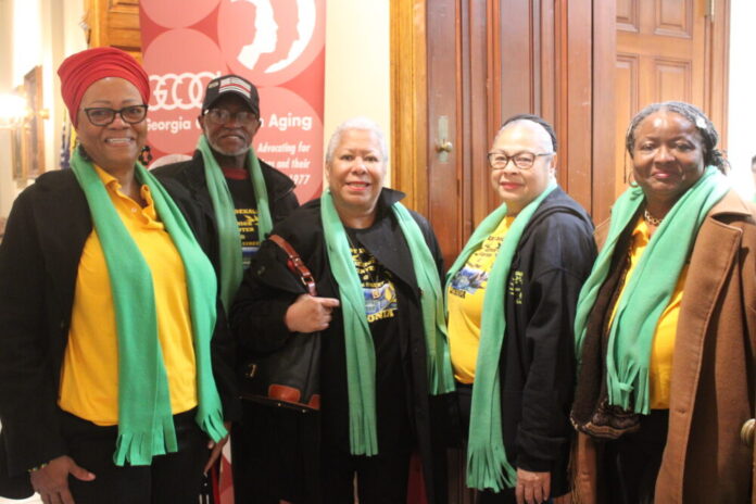 Councilwoman Diane Howard from Lithonia (l) with seniors from the East Dekalb at Bruce Street Senior Center (Zaire Breedlove/Fresh Take Georgia).