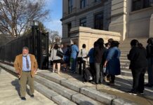 Meet Phil Lunney volunteer greeter at the Gold Dome Volunteer Phil Lunney greets visitors at the Georgia State Capitol on Thursday, Feb. 6, 2024 (Josh Azriel/Fresh Take Georgia).