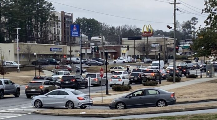 Georgia House considers bill revising driving rules for funeral motorcades Traffic on Peachtree Industrial Boulevard in Chamblee (Gabby Miller/Fresh Take Georgia).