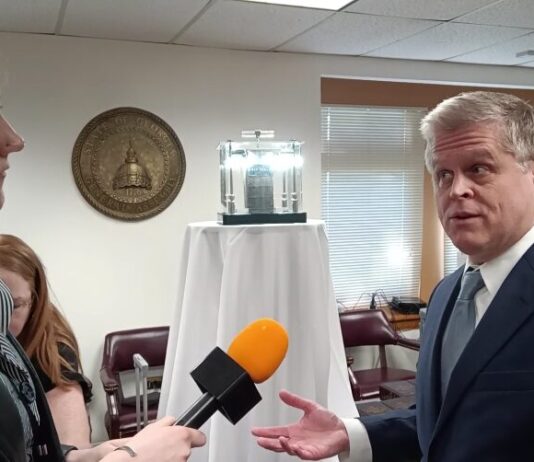 Religious groups visit Capitol to hand out Bibles to legislators Founder of the First American Bible Project, Stephen Skelton speaks in front of one of the original copies of the Robert Aitken Bible (Zaire Breedlove/Fresh Take Georgia).