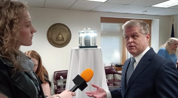 Religious groups visit Capitol to hand out Bibles to legislators Founder of the First American Bible Project, Stephen Skelton speaks in front of one of the original copies of the Robert Aitken Bible (Zaire Breedlove/Fresh Take Georgia).