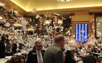 Governor Kemp to decide which bills to sign into law Georgia House of Representatives celebrating the end of Sine Die by throwing makeshift confetti into the air. (Zaire Breedlove/Fresh Take Georgia)