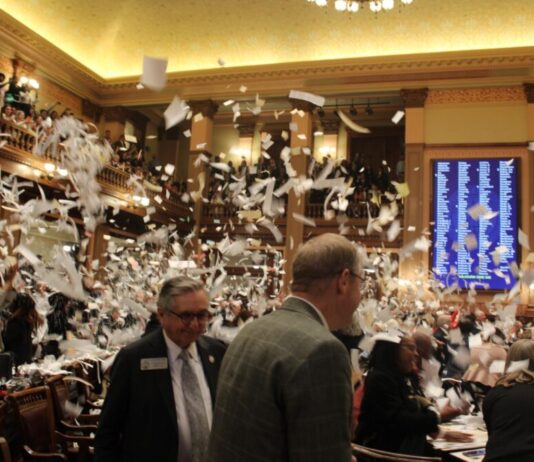 Governor Kemp to decide which bills to sign into law Georgia House of Representatives celebrating the end of Sine Die by throwing makeshift confetti into the air. (Zaire Breedlove/Fresh Take Georgia)