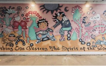 Painting the city with purpose: Living Walls’ fight for representation in Atlanta Karaoke Rodriguez’s “Nothing Can Destroy the Spirit of the Earth” on Arizona & DeKalb Avenue Hayley Schultz/Fresh Take Georgia).